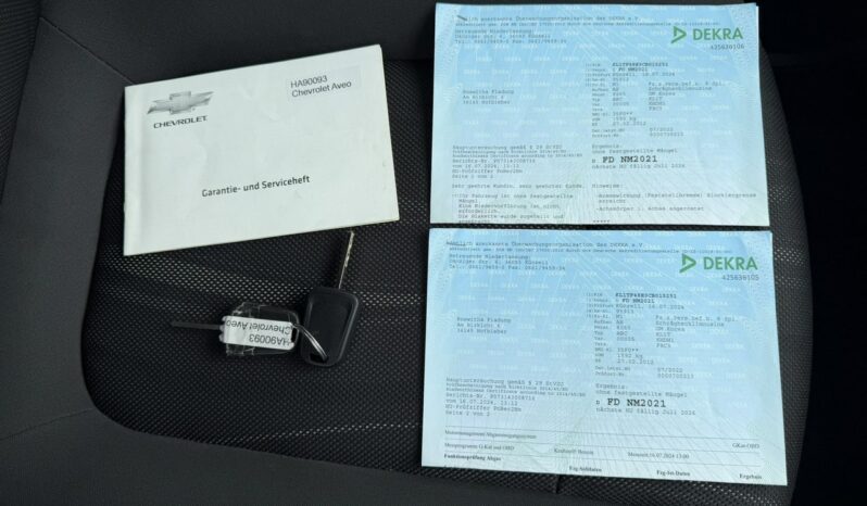 Chevrolet Aveo Klimatyzacja, 2 kpl. kół, Podgrzewane fotele, Alu 17″, Czujniki parkow full