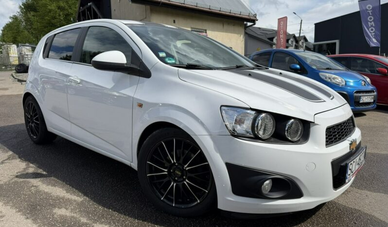 Chevrolet Aveo Klimatyzacja, 2 kpl. kół, Podgrzewane fotele, Alu 17″, Czujniki parkow full