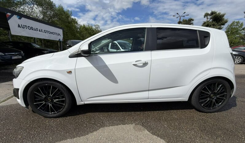 Chevrolet Aveo Klimatyzacja, 2 kpl. kół, Podgrzewane fotele, Alu 17″, Czujniki parkow full