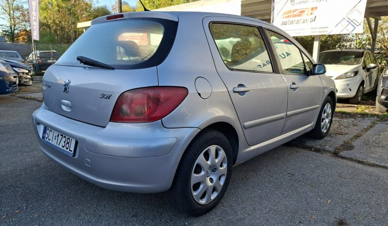 Peugeot 307 Ele szyby, Ele lusterka, Podłokietnik przód tył, 2 kluczyki full