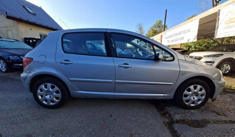 Peugeot 307 Ele szyby, Ele lusterka, Podłokietnik przód tył, 2 kluczyki full